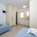 Dionysos In Сasa de vacaciones